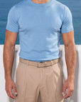 Man in light blue knit t-shirt with beige trousers, Morengar menswear