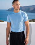 Man in light blue knit t-shirt outdoors, Morengar summer style