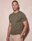Man in olive green knit t-shirt, front view, Morengar menswear