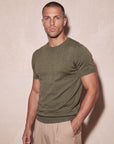 Man in olive green knit t-shirt, front view, Morengar menswear