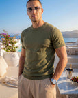 Man in olive green knit t-shirt outdoors, Morengar menswear