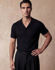 Man wearing black knit shirt with vertical texture, Morengar summer style