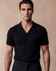 Man in black vertical texture knit shirt, front view, Morengar menswear