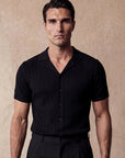 Man in black vertical texture knit shirt, front view, Morengar menswear