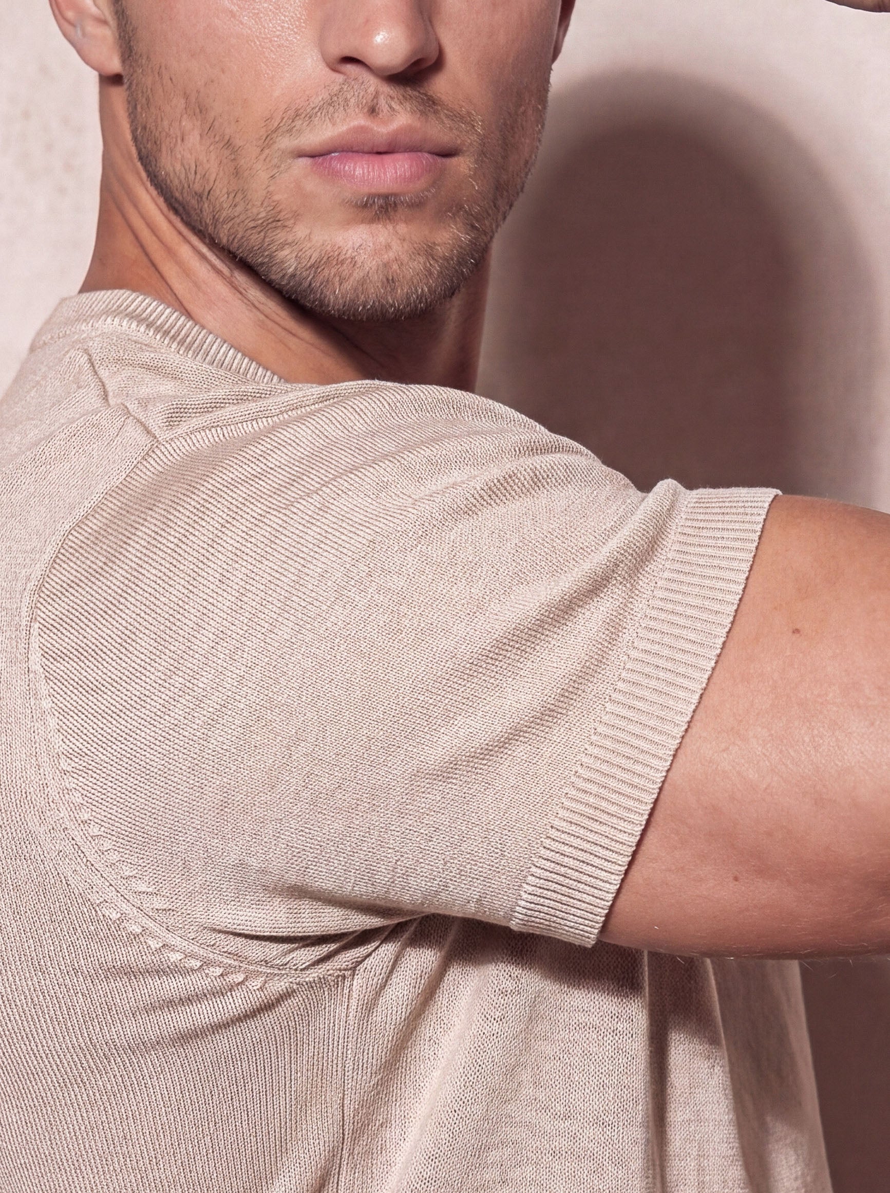 Close-up of beige knit t-shirt fabric, Morengar soft-touch stretch