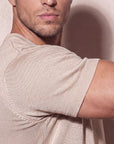 Close-up of beige knit t-shirt fabric, Morengar soft-touch stretch