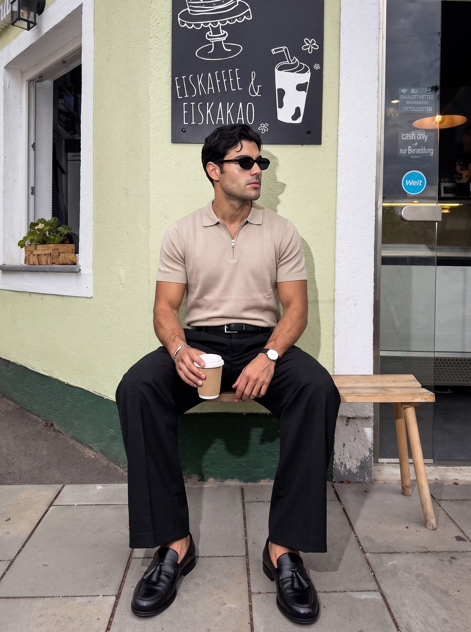 Man in beige knit polo sitting outdoors, Morengar summer style